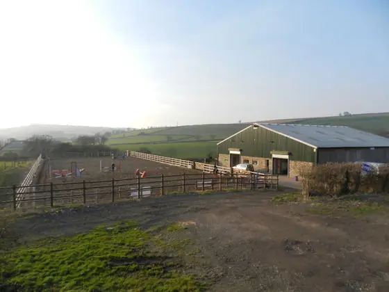 The yard and arena at Maes Knoll Farm